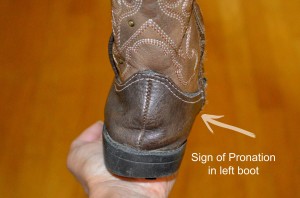 sign of pronation in left boot in a person with a pronated (flat) foot